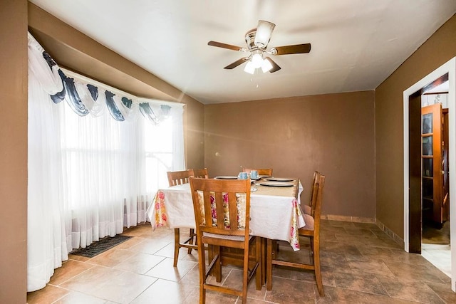 dining area featuring ceiling fan