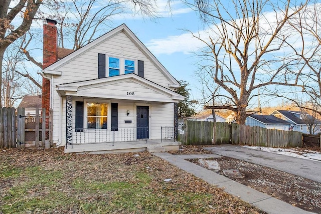 bungalow-style house featuring covered porch