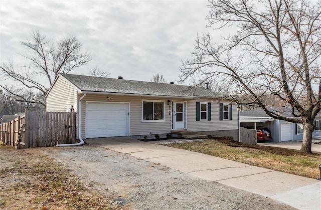 view of front of property with a carport