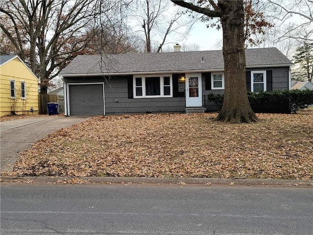 single story home featuring a garage