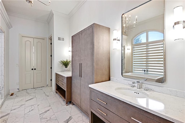 bathroom with an inviting chandelier, vanity, and crown molding