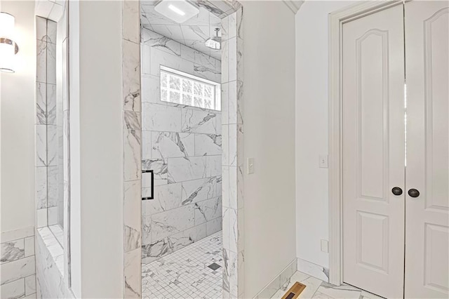 bathroom featuring an enclosed shower