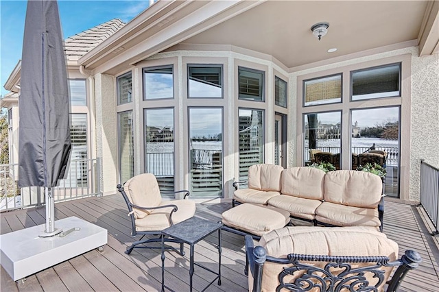 wooden deck featuring an outdoor living space