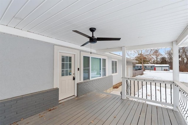 snow covered deck with ceiling fan