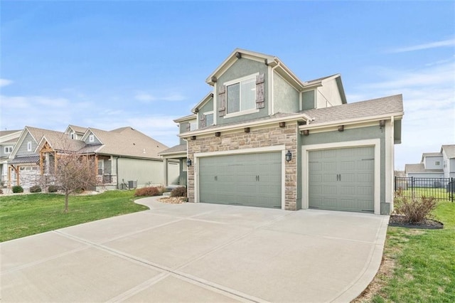 view of front of home featuring a garage and a front lawn