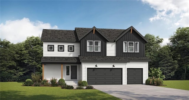 view of front of home featuring a front yard and a garage