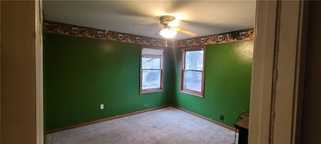 unfurnished room featuring ceiling fan