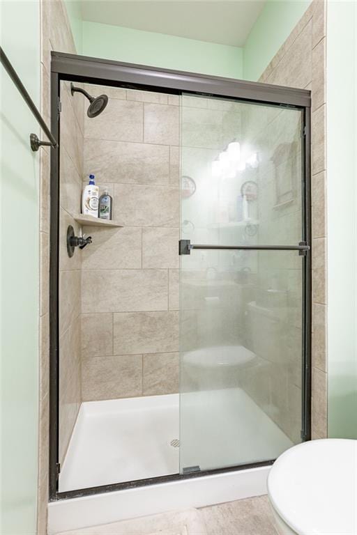 bathroom with an enclosed shower