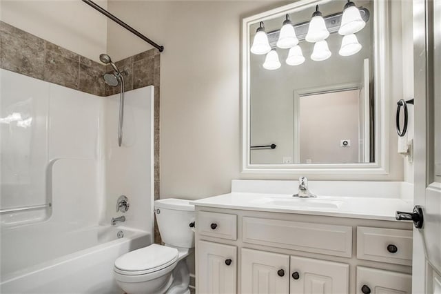 full bathroom featuring vanity, toilet, and bathtub / shower combination