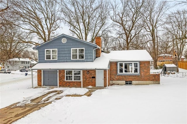 view of front of property featuring a garage