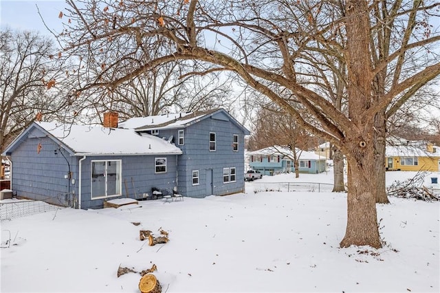 view of snow covered property