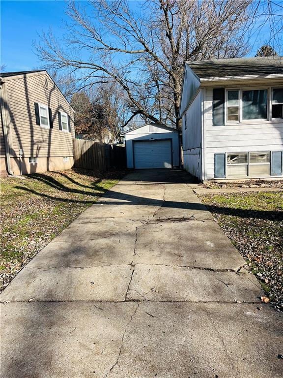 view of home's exterior with an outbuilding and a garage