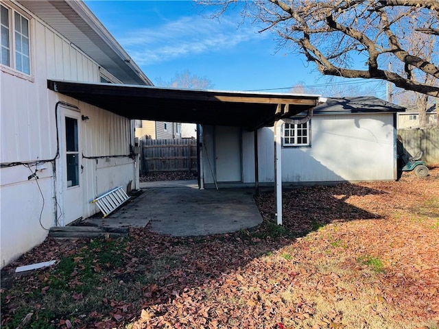 exterior space with a carport