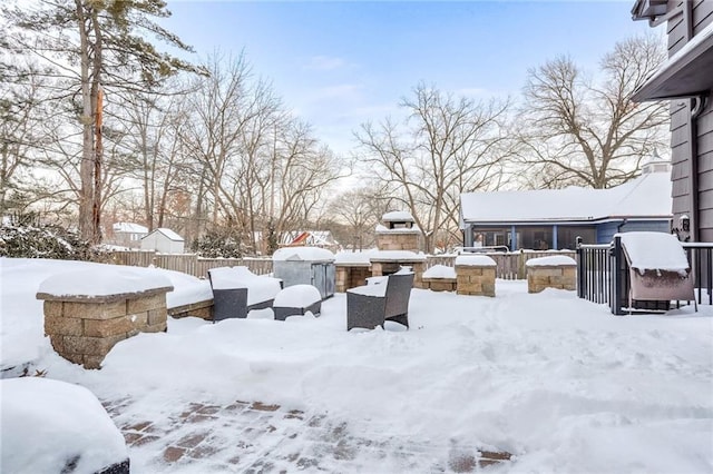 view of yard layered in snow