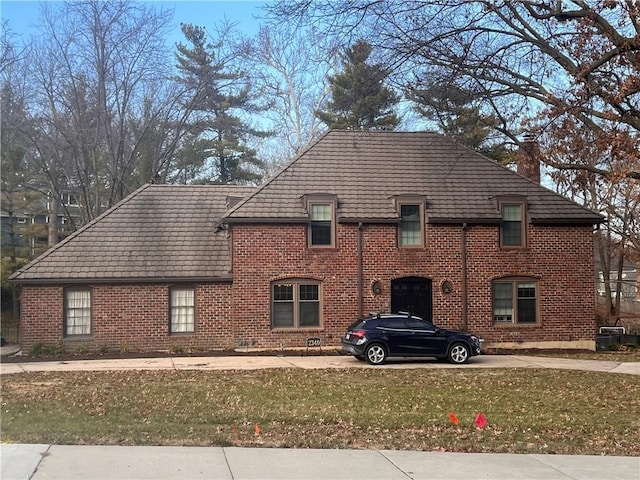 view of home's exterior featuring a yard