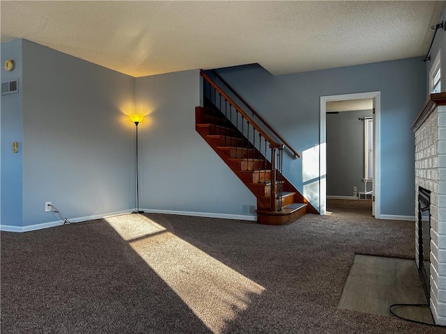 unfurnished living room featuring a fireplace and carpet floors