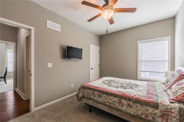 carpeted bedroom featuring ceiling fan