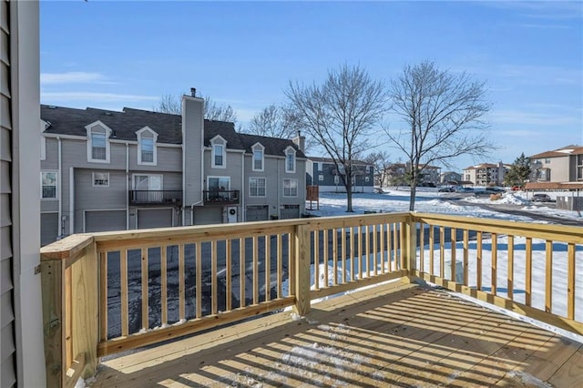 view of snow covered deck