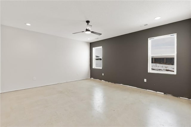 unfurnished room featuring ceiling fan