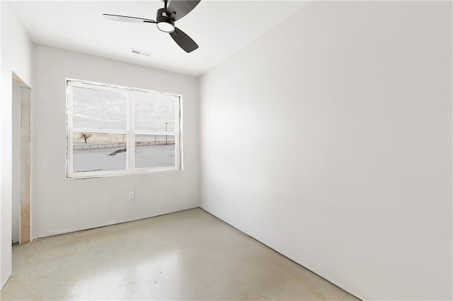 spare room with ceiling fan