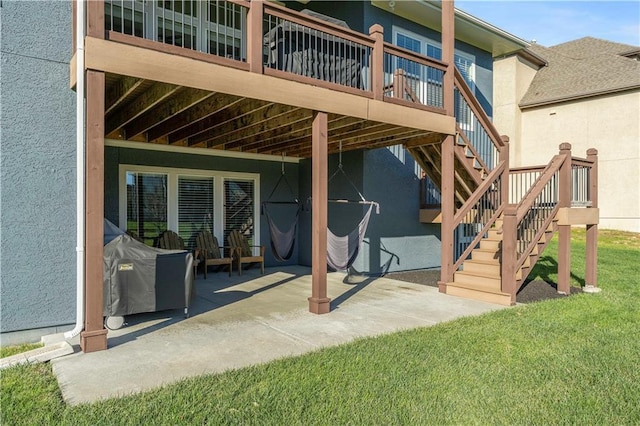 view of patio / terrace featuring area for grilling and a wooden deck