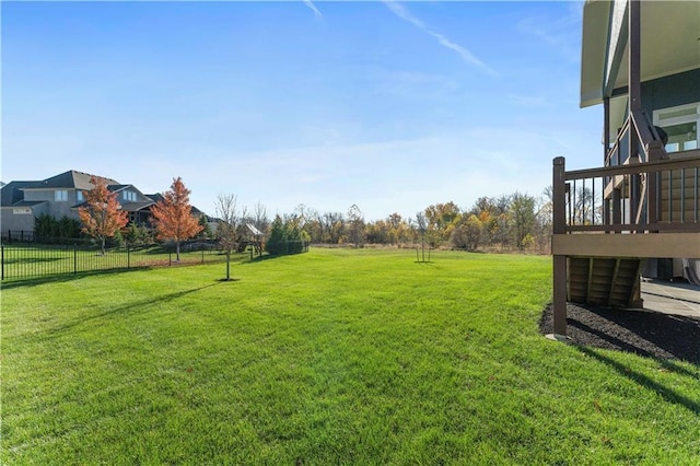 view of yard featuring a wooden deck