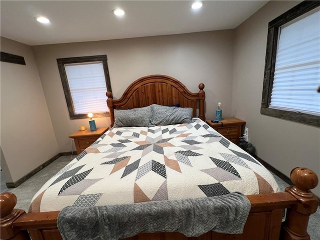 bedroom featuring light colored carpet