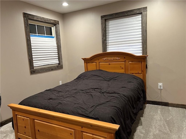 bedroom with light carpet