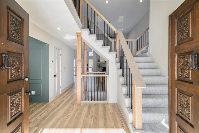 entrance foyer with light hardwood / wood-style floors