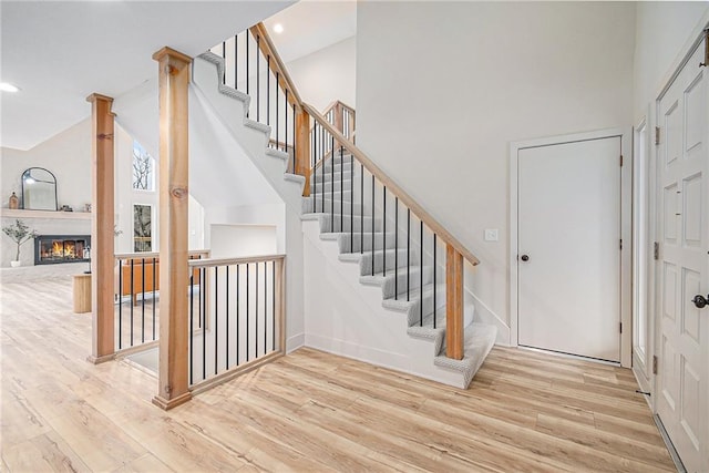 stairway with wood-type flooring