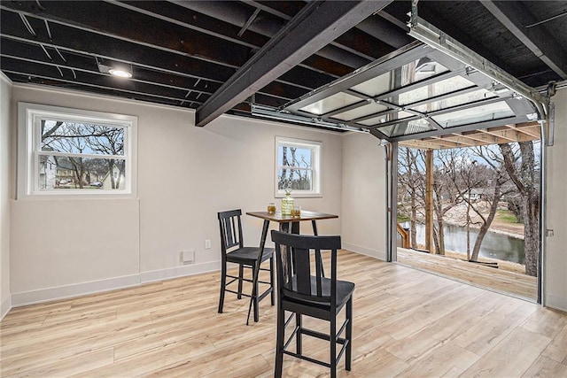 dining area with light wood-type flooring