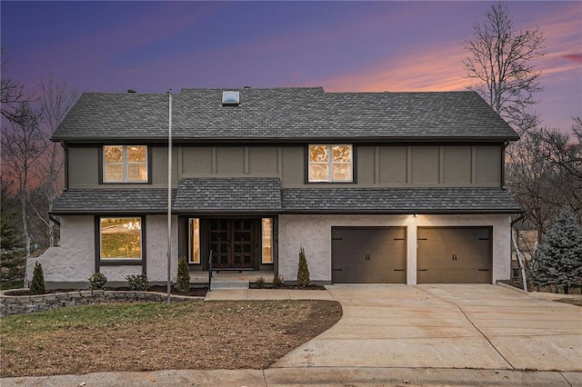 view of front of house with a garage