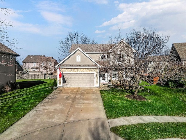 view of front of house featuring a garage and a front lawn