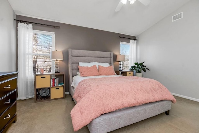 bedroom with light carpet, ceiling fan, and lofted ceiling