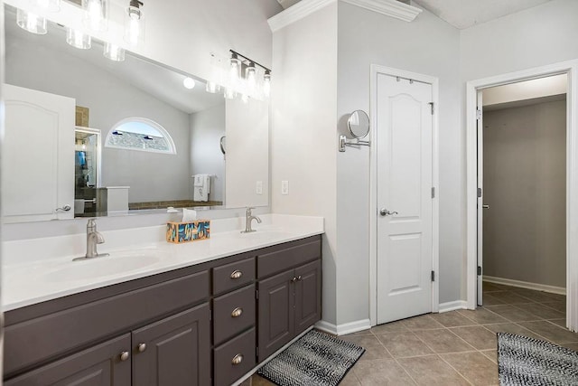 bathroom featuring tile patterned floors, vanity, lofted ceiling, and walk in shower