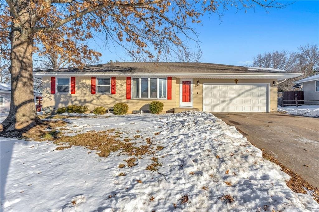 ranch-style home with a garage