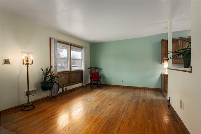 interior space with hardwood / wood-style flooring