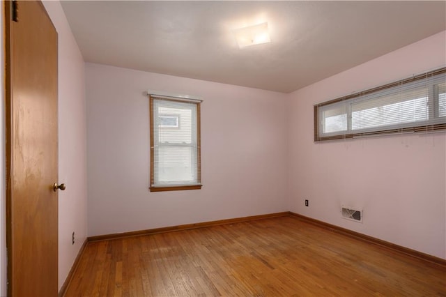 empty room featuring light hardwood / wood-style floors