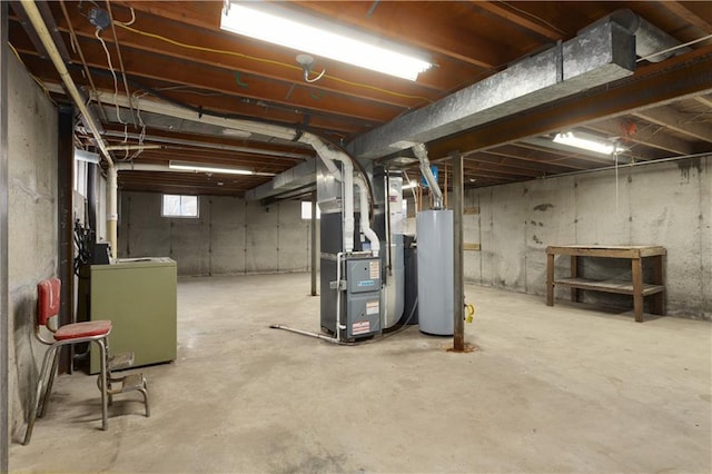 basement with washer / dryer, gas water heater, and heating unit