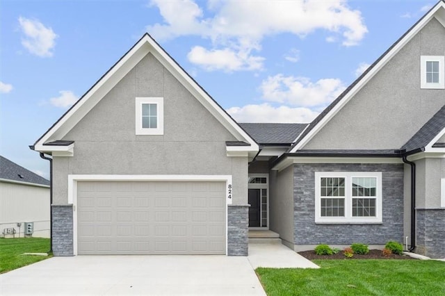 view of front of property with stucco siding, concrete driveway, a front lawn, and stone siding