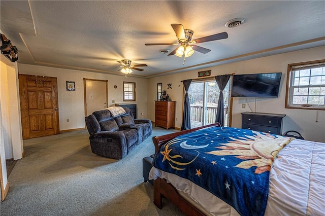 bedroom with ceiling fan, carpet floors, a textured ceiling, access to outside, and ornamental molding