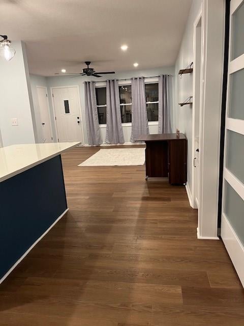 corridor featuring dark hardwood / wood-style flooring