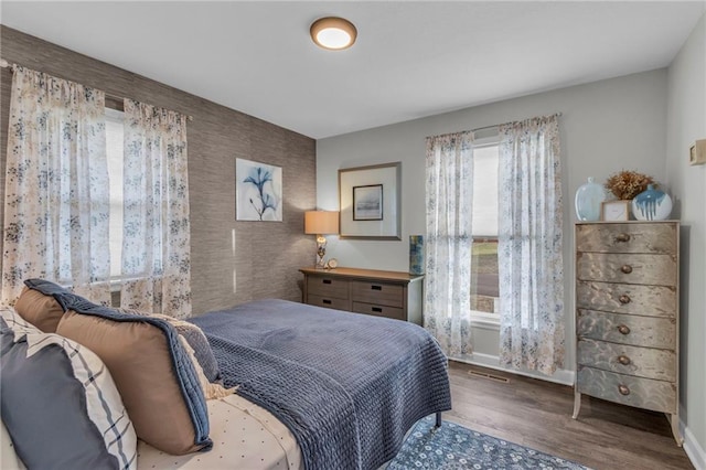 bedroom featuring hardwood / wood-style floors