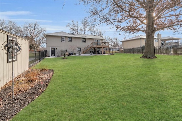 view of yard featuring a deck