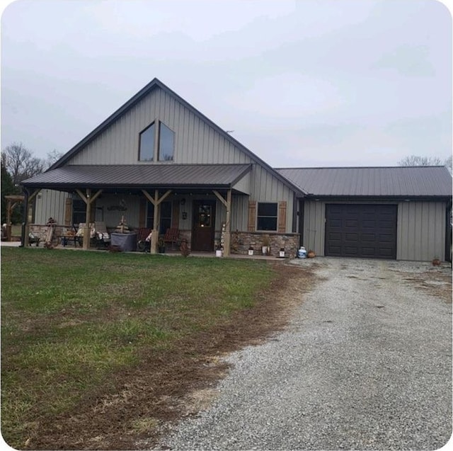 view of front of house with a front lawn and a garage