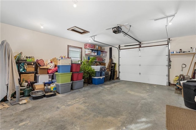 garage featuring a garage door opener