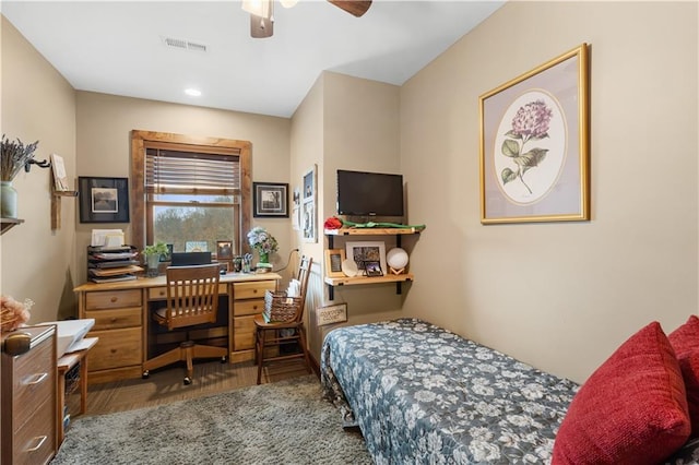 carpeted bedroom with ceiling fan