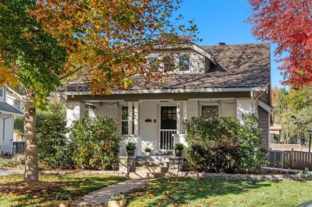 view of front of property with a front lawn and a porch