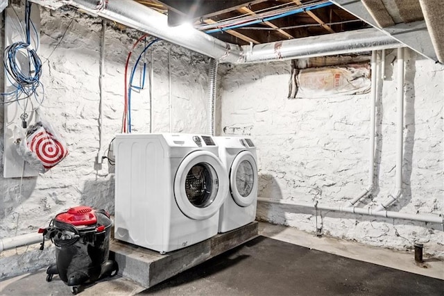 washroom featuring washer and dryer