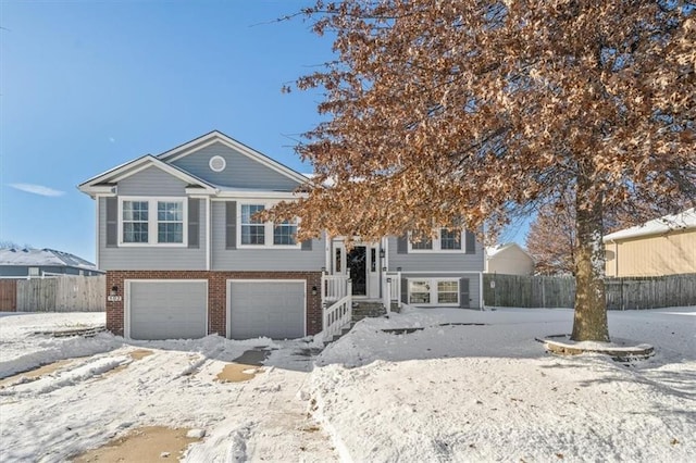 split foyer home featuring a garage